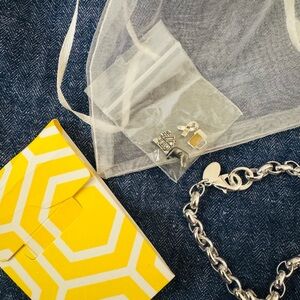 Chic Silver Charm Bracelet with pouch and 4 charms included!